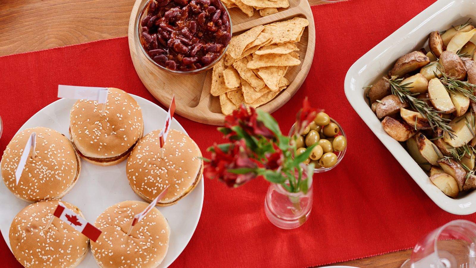 A shared potluck-style table filled with air-fried side dishes and mains