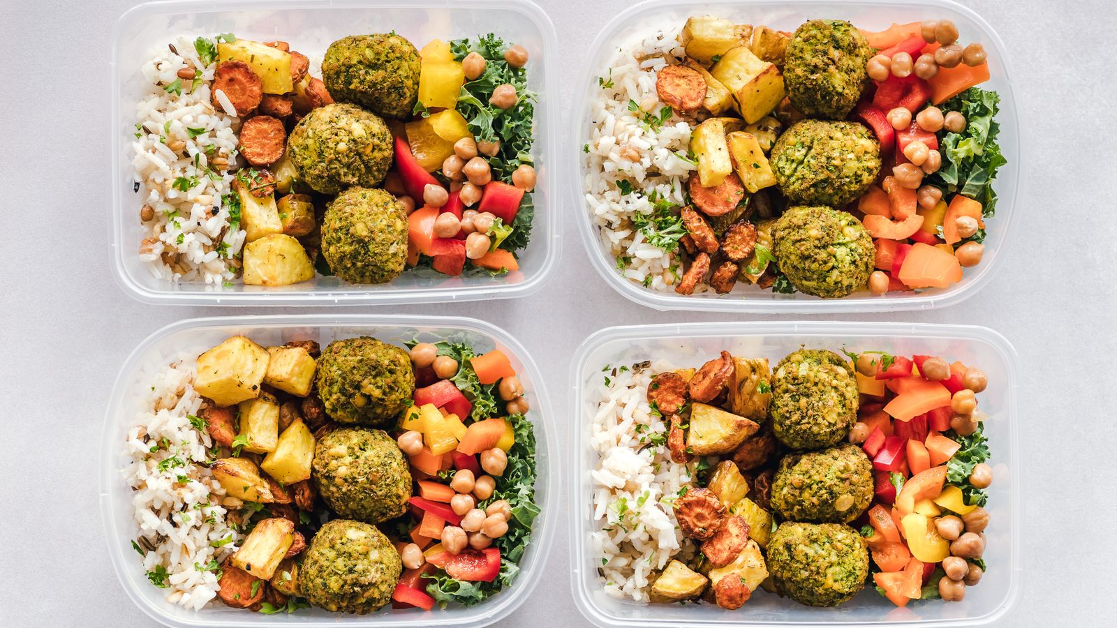 Meal prep containers filled with air-fried food ready for the week