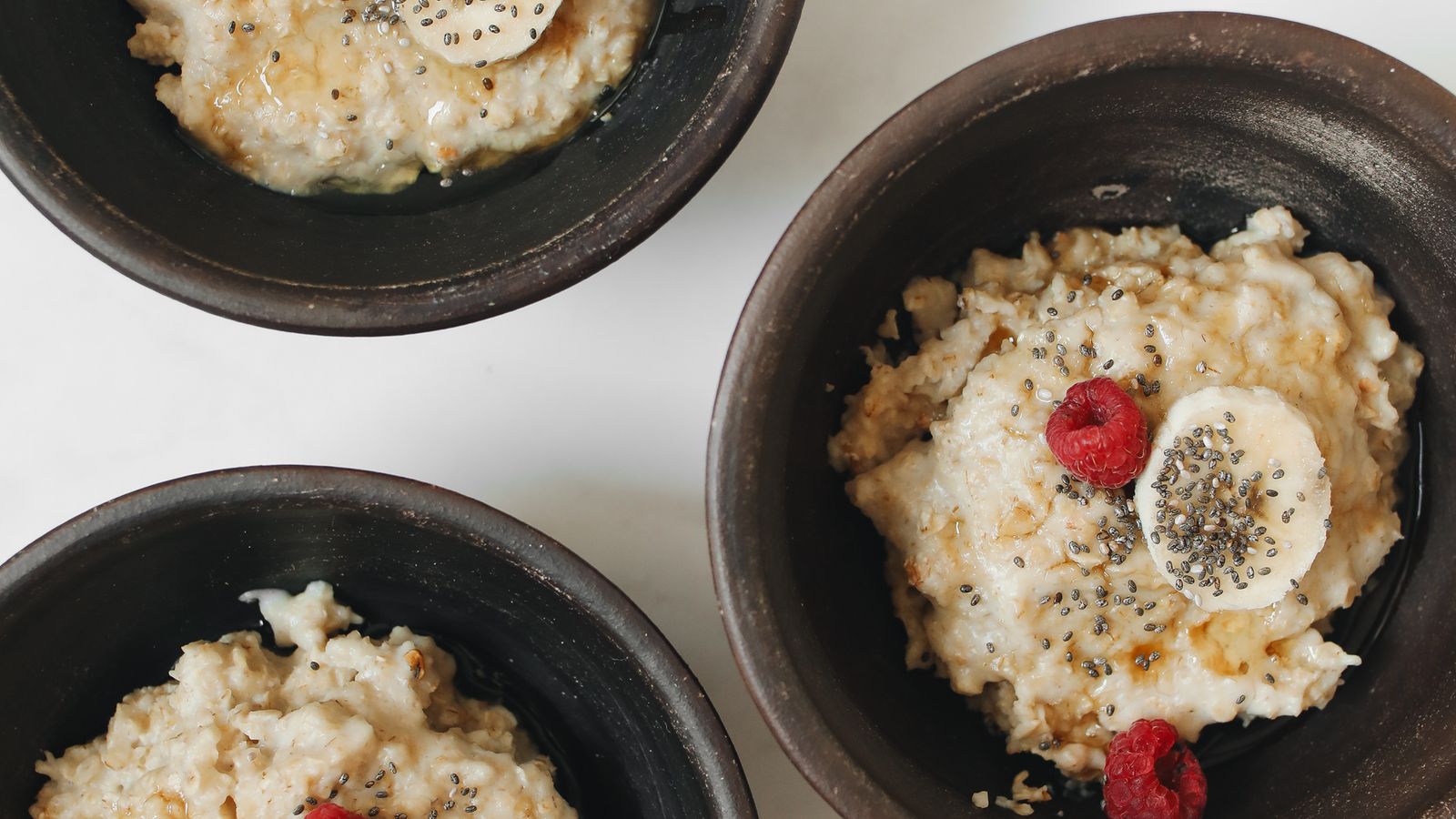Healthy low-oil meal prep bowls prepared alongside an air fryer