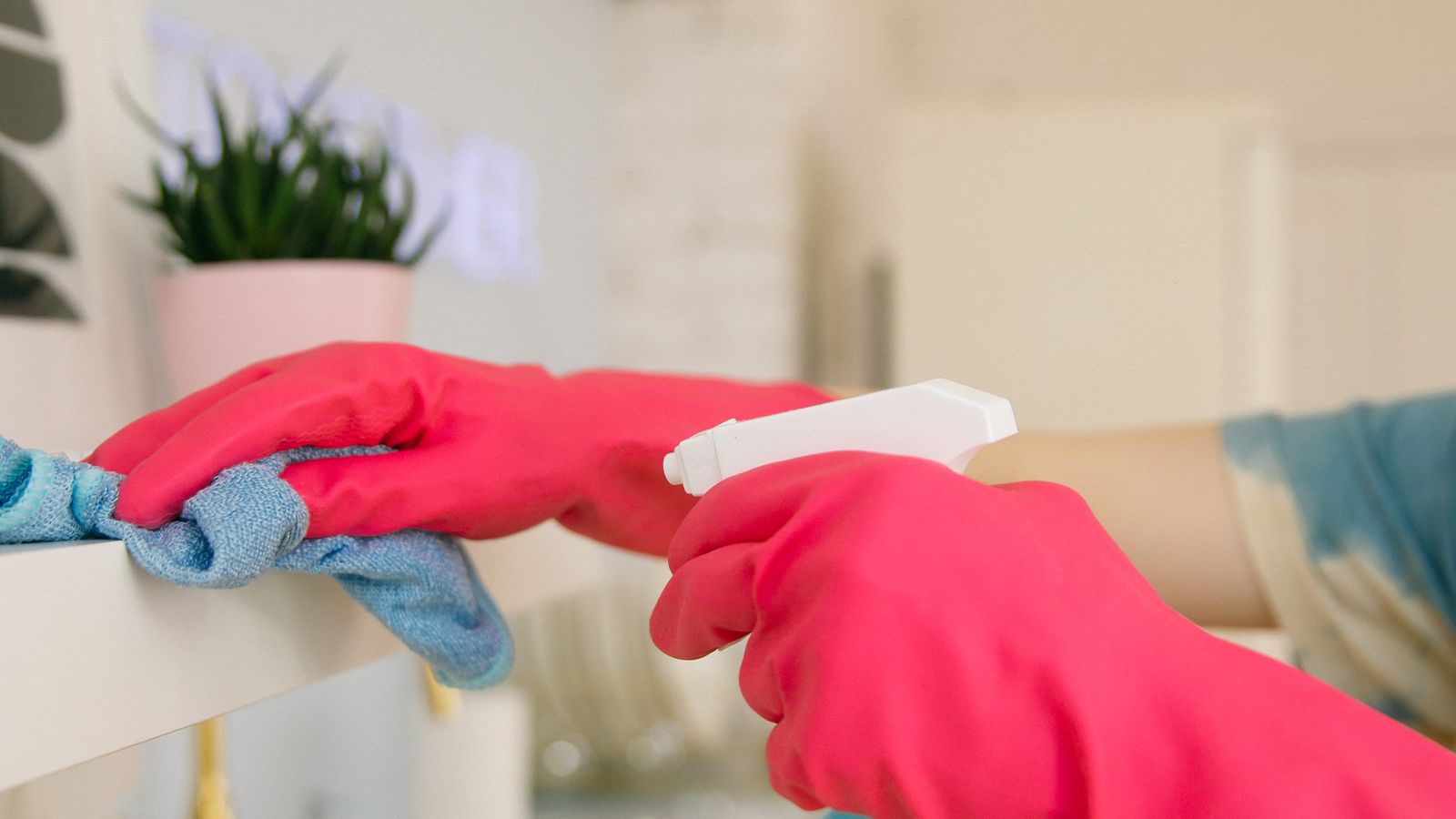 Kitchen counter with cleaning brush, cloth, and baking supplies for stone maintenance