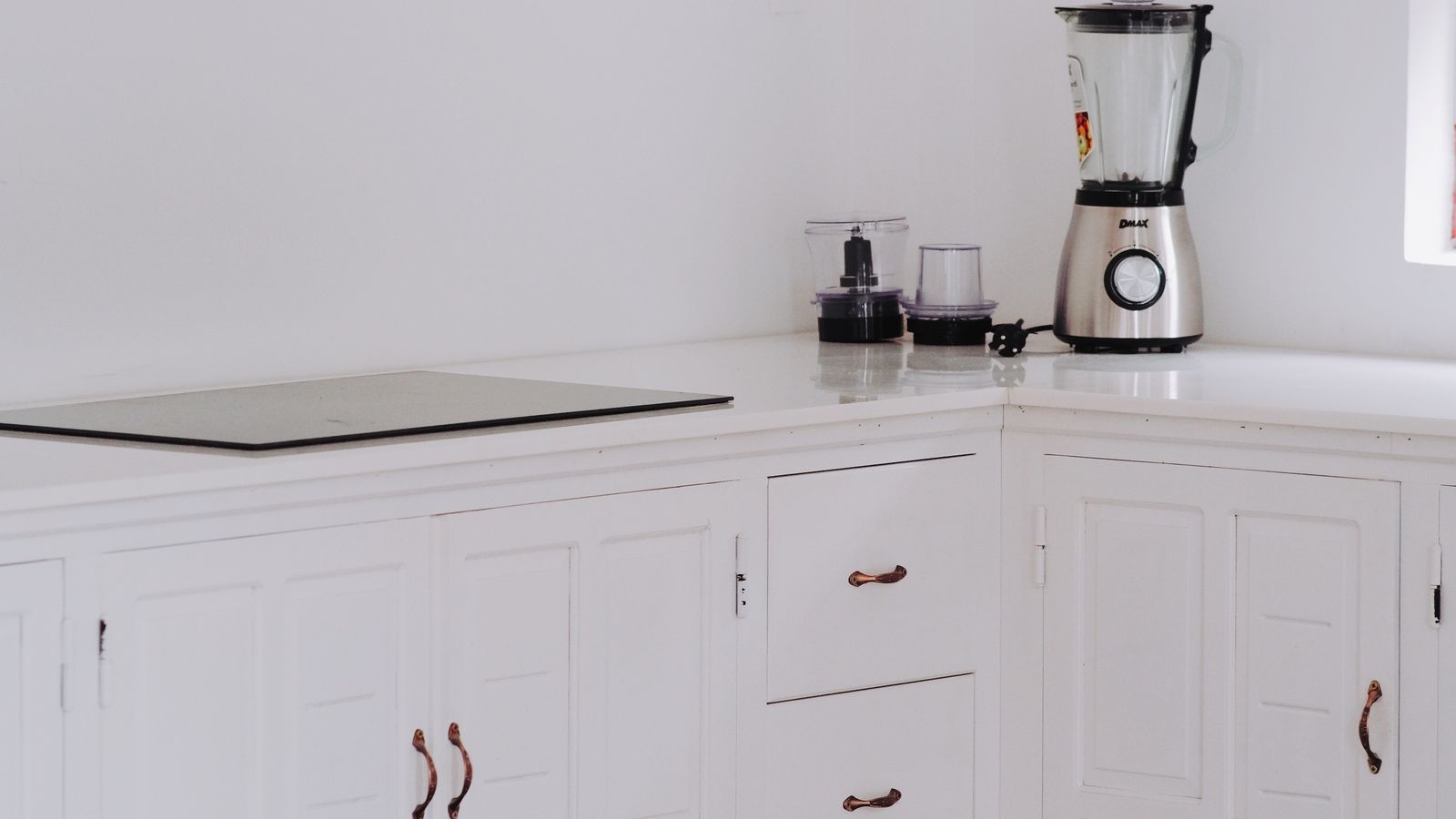 Compact kitchen mat and pan storage after downsizing air fryer accessories