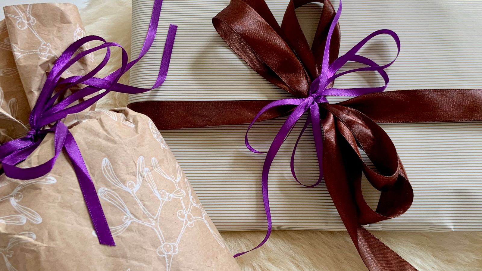 Gift-wrapped present with ribbon representing a household air fryer bundle gift