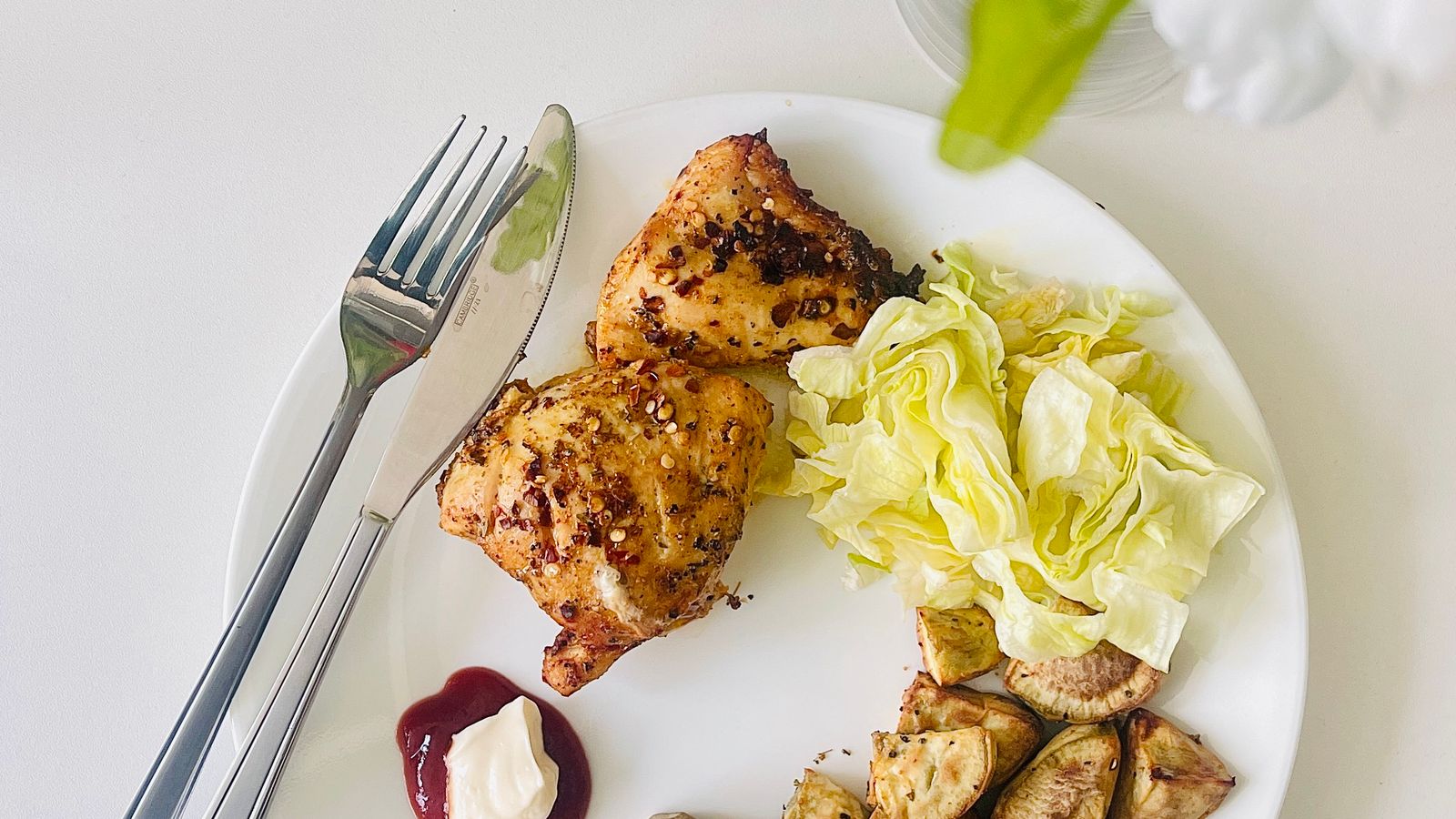 Healthy air fryer meal with grilled chicken and roasted vegetables on a plate