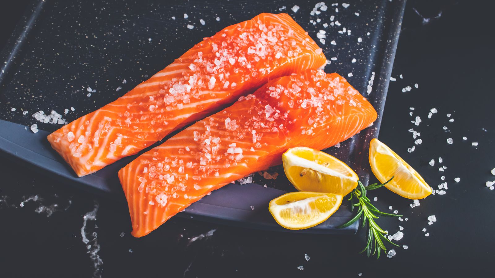 Fresh raw salmon fillet ready to be air fried as an alternative to cheese-based snacks