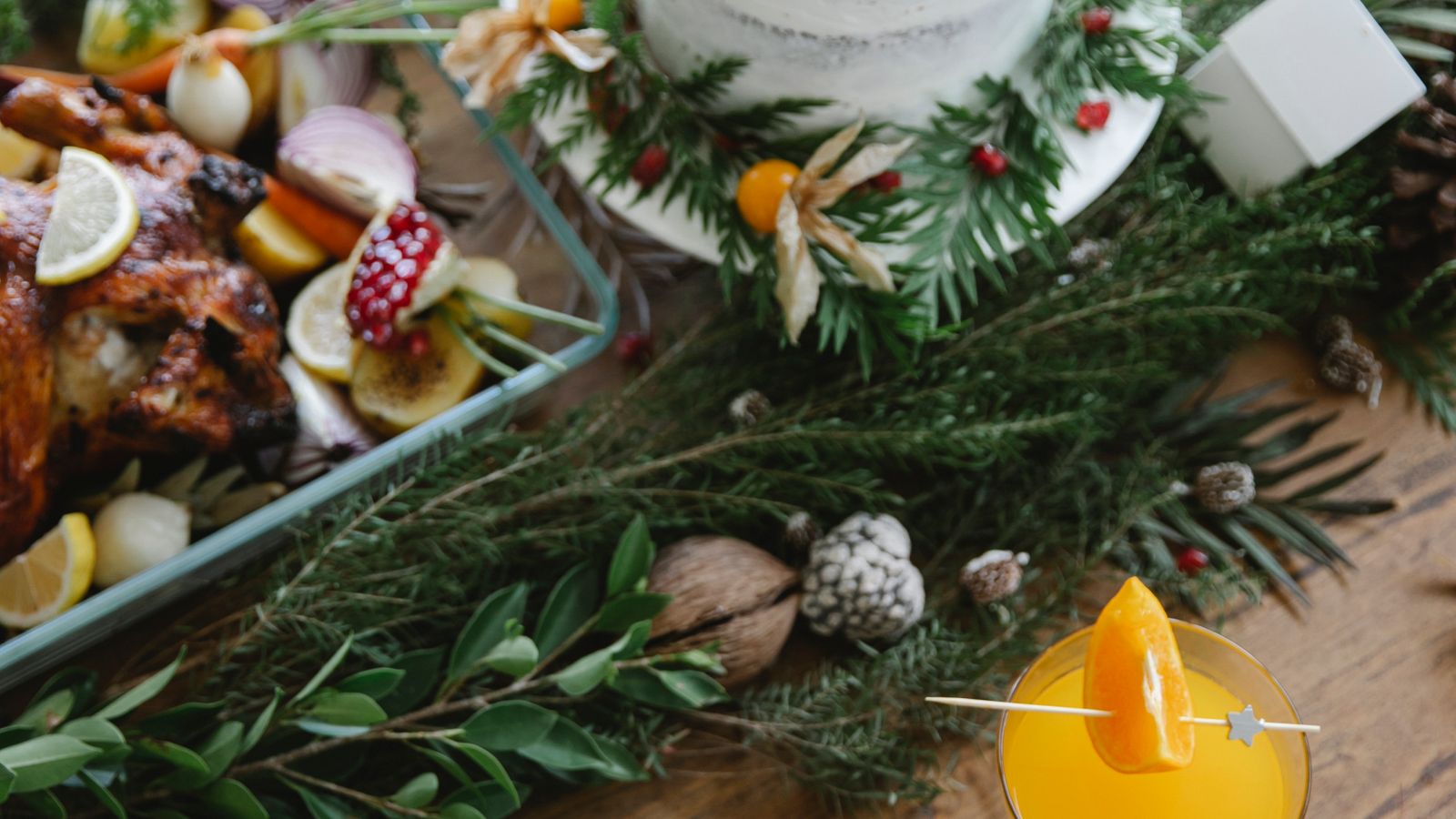 Festive holiday dinner table set with multiple dishes ready for a family meal