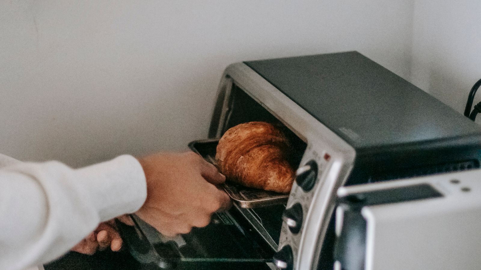 Small metal baking pan sized for a compact toaster oven style air fryer
